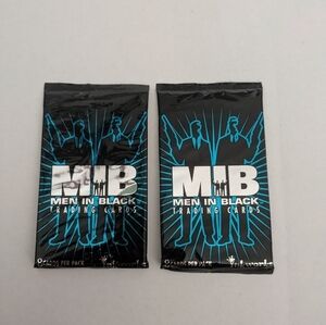 Men in Black trading cards, dated 1997. 2 packs unopened.